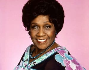 Isabel Sanford as Louise Jefferson 