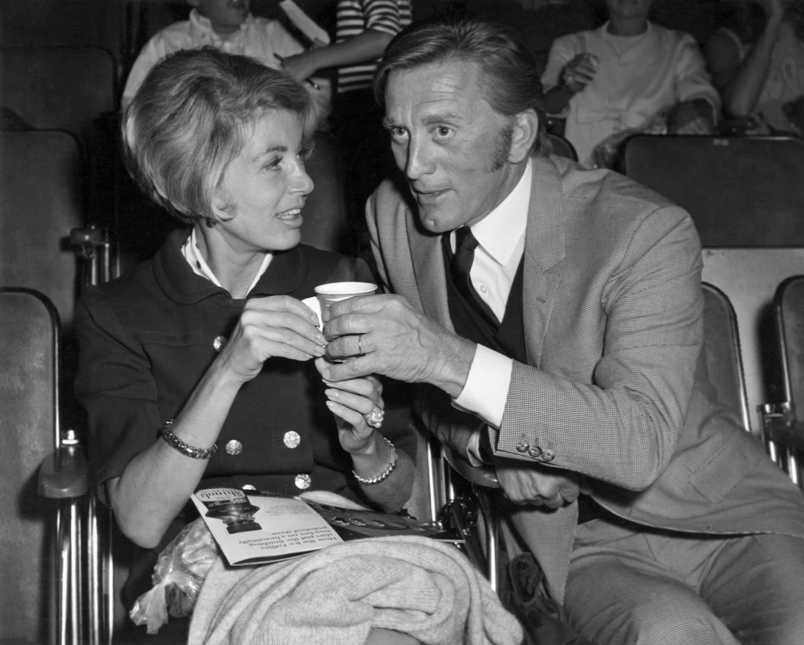 Anne Buydens sitting in audience with her husband, Kirk Douglas, ca. 1960s