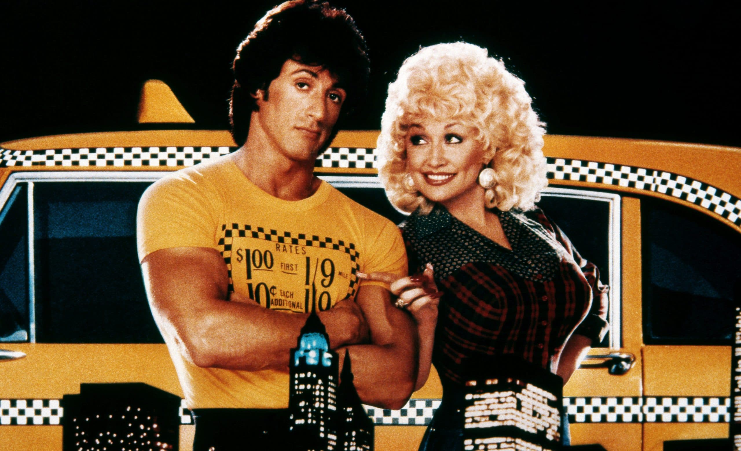 RHINESTONE, from left: Sylvester Stallone, Dolly Parton, 1984