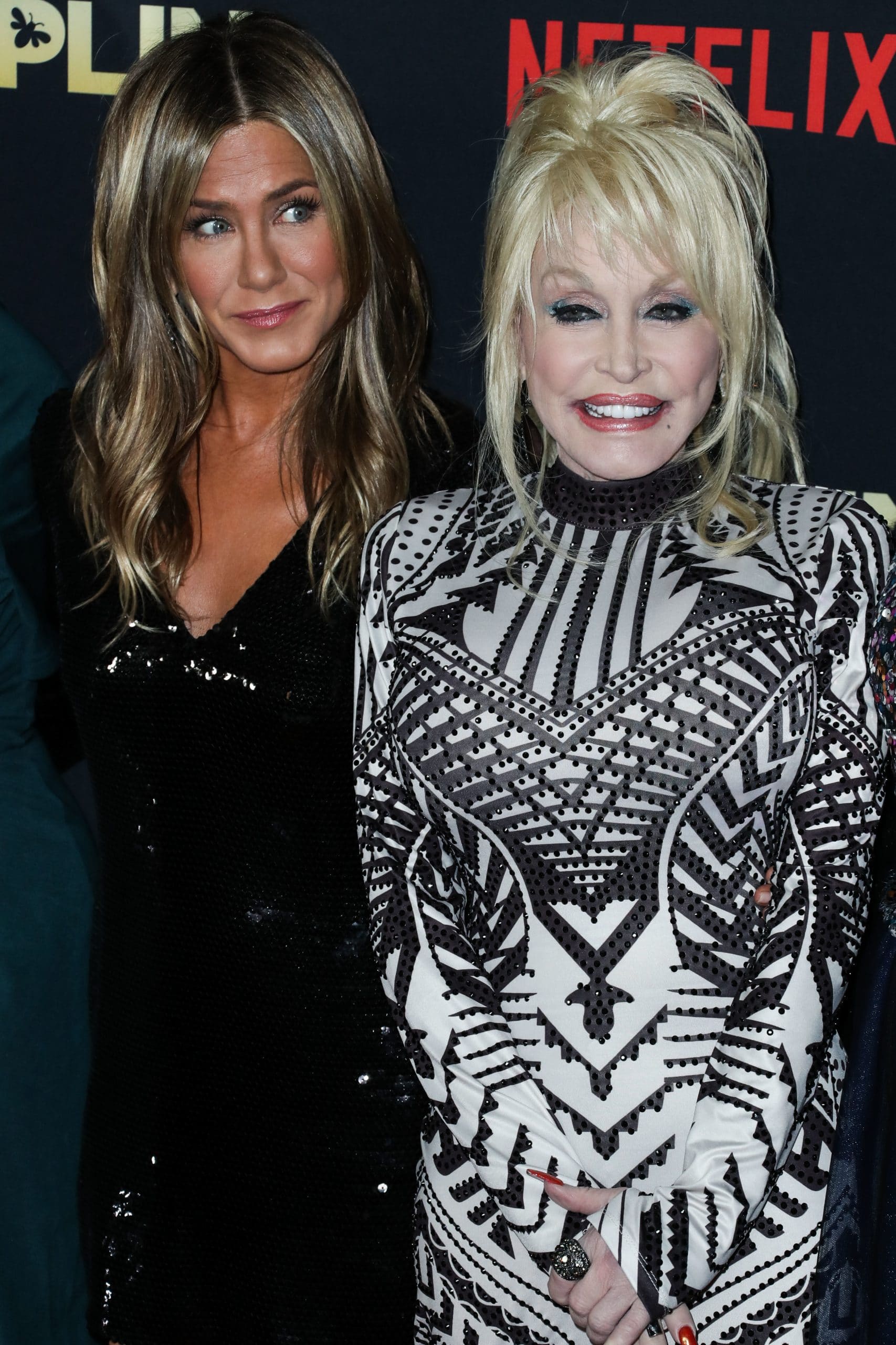 Actress Jennifer Aniston and singer Dolly Parton