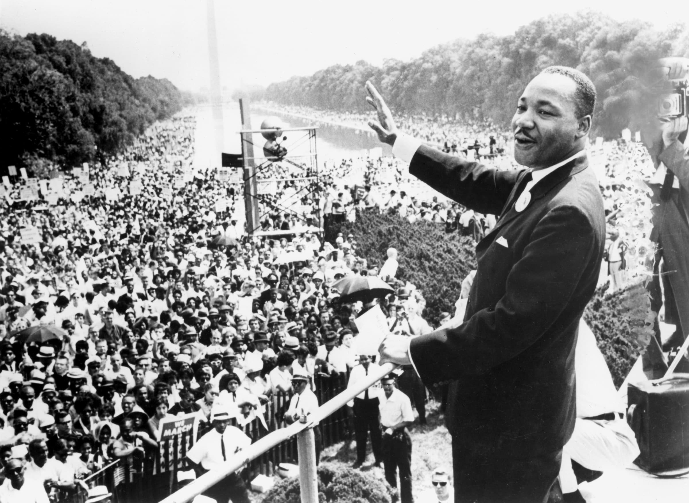 DR. MARTIN LUTHER KING, JR. joyously addresses a mass audience in Washington, DC, 1963