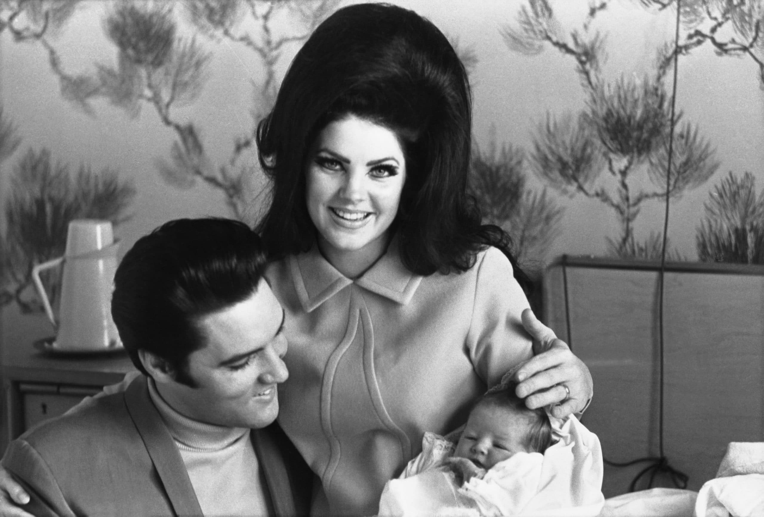 Elvis Presley, Priscilla Presley, with baby Lisa Marie Presley