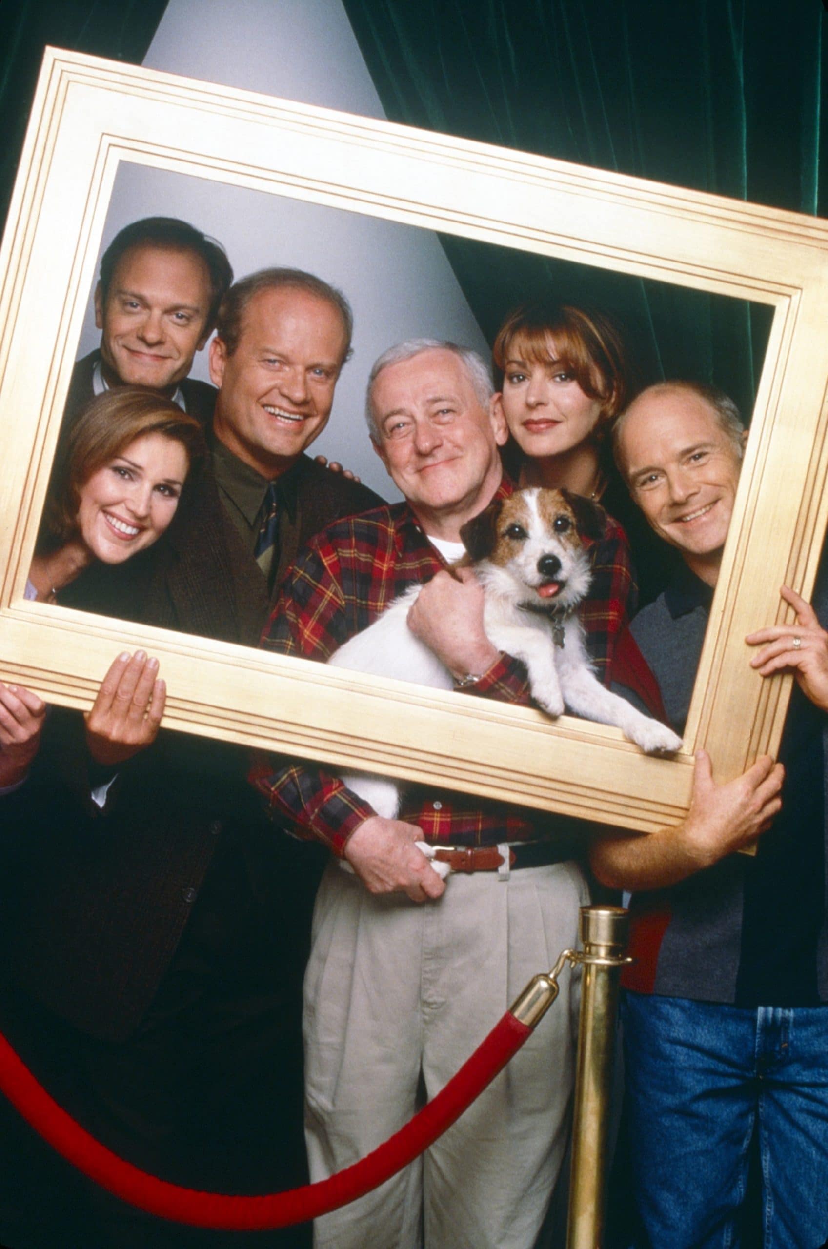 FRASIER, from left: Peri Gilpin (bottom), David Hyde Pierce, Kelsey Grammer, John Mahoney, Jane Leeves, Dan Butler, with Moose, as Eddie, (1993-2004)