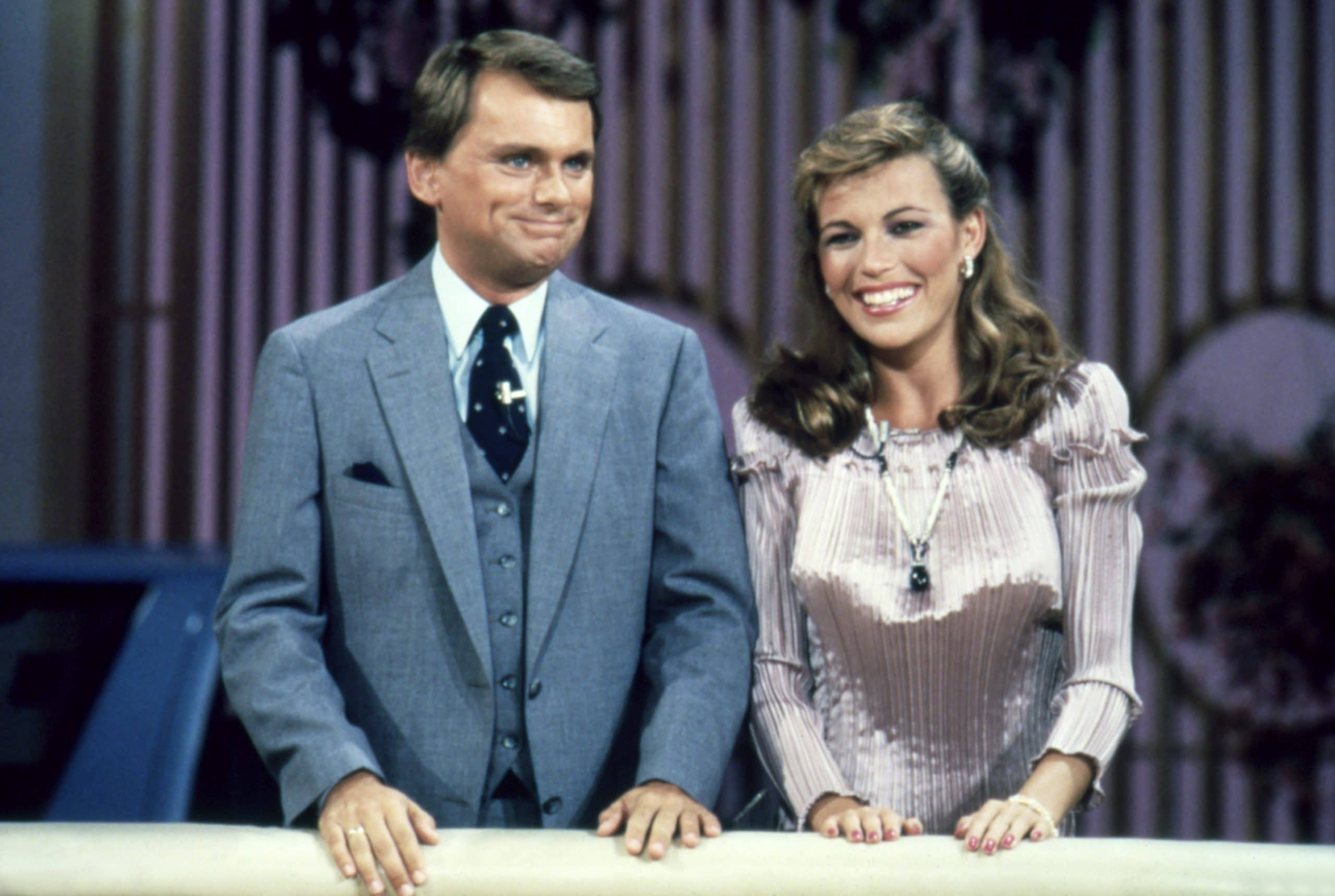 WHEEL OF FORTUNE, (from left): Pat Sajak, Vanna White, (circa 1983), 1975-