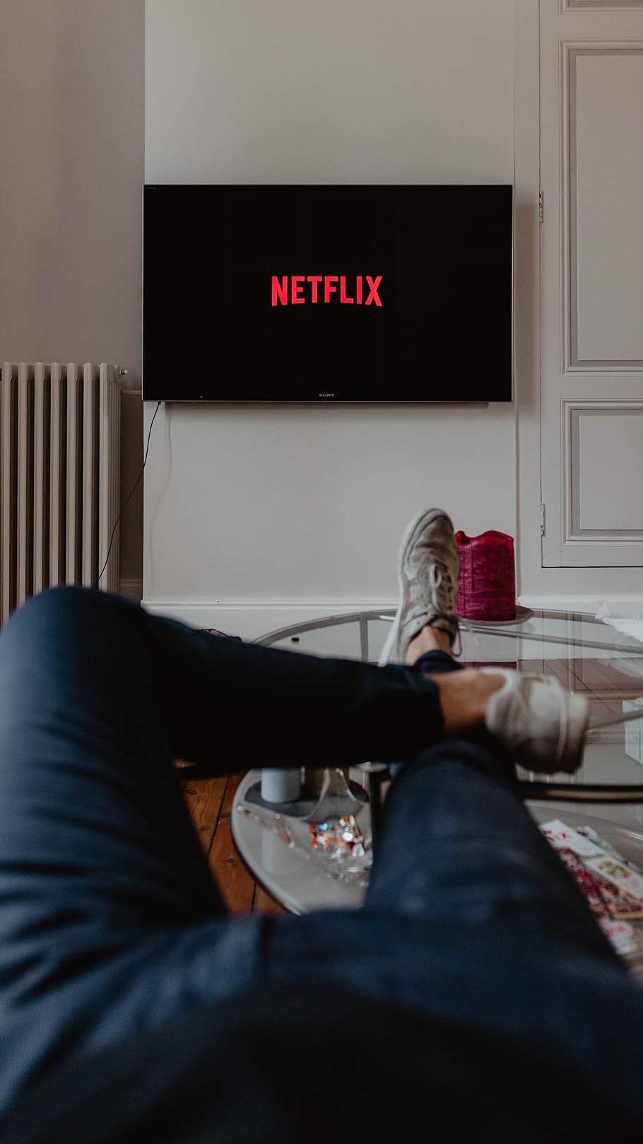 person watching netflix lazy relaxing