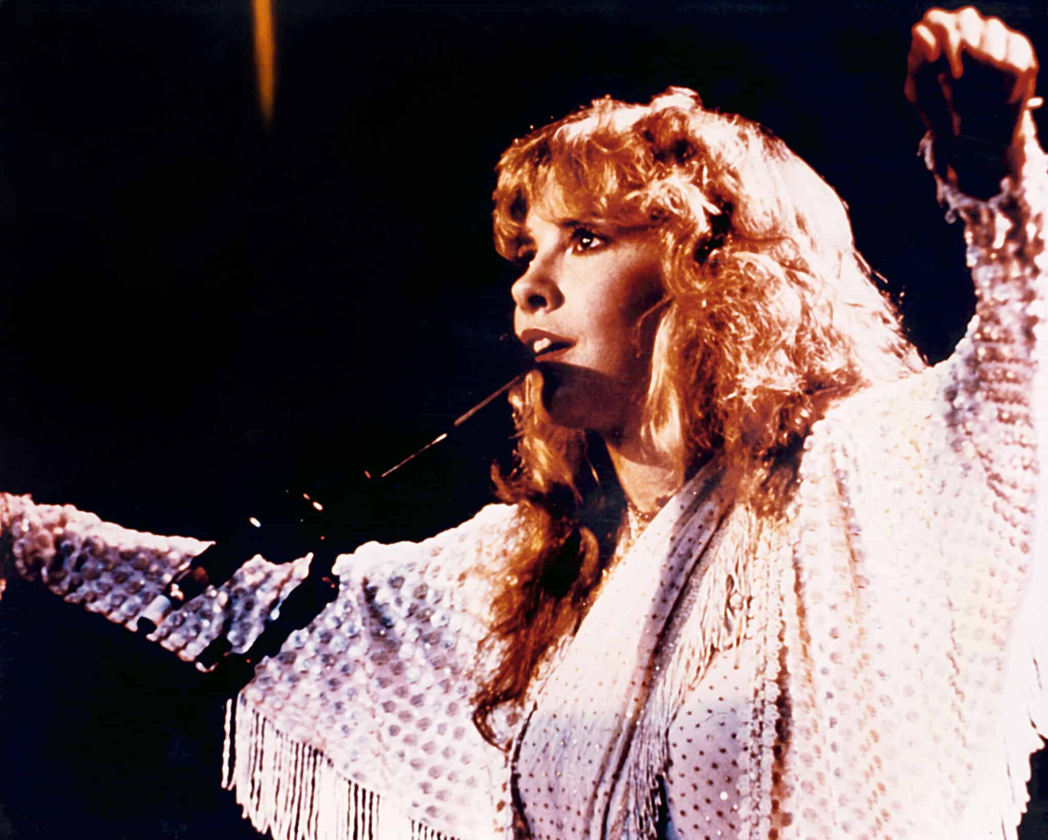 STEVIE NICKS, performing with FLEETWOOD MAC, c. mid 1970s