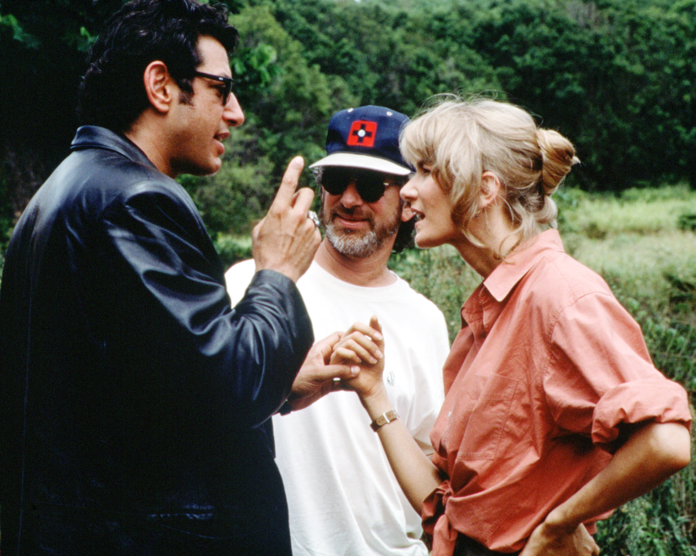 THE MAKING OF JURASSIC PARK, Jeff Goldblum, Steven Spielberg, Laura Dern on set, 1995