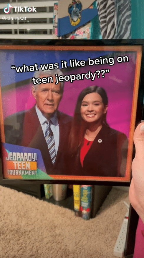 Claire Sattler and Alex Trebek pose for teen Jeopardy