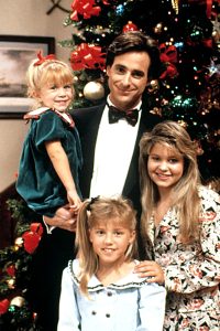 Bure's friendship with Saget began when they started playing TV father and daughter