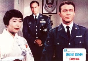 SAYONARA, from left: Miyoshi Umeki, Marlon Brando, Red Buttons