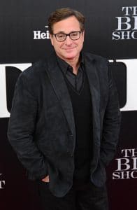 Saget was described as energetic and in good humor when he checked into the hotel where he stayed