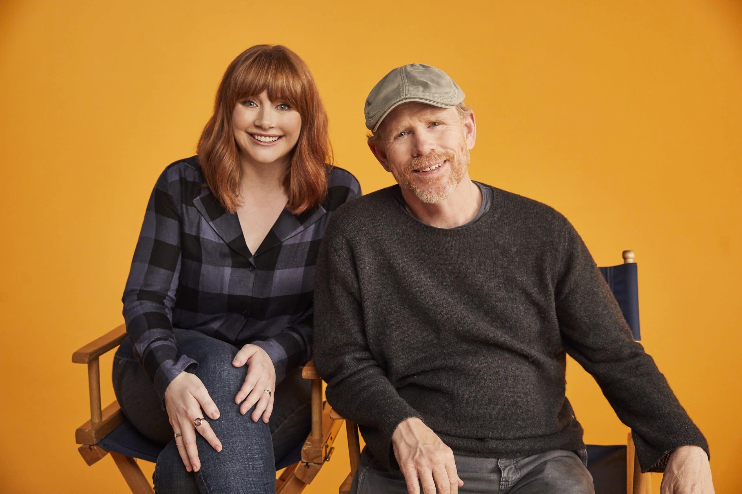 DADS, from left: director Bryce Dallas Howard, producer Ron Howard, on set, 2019