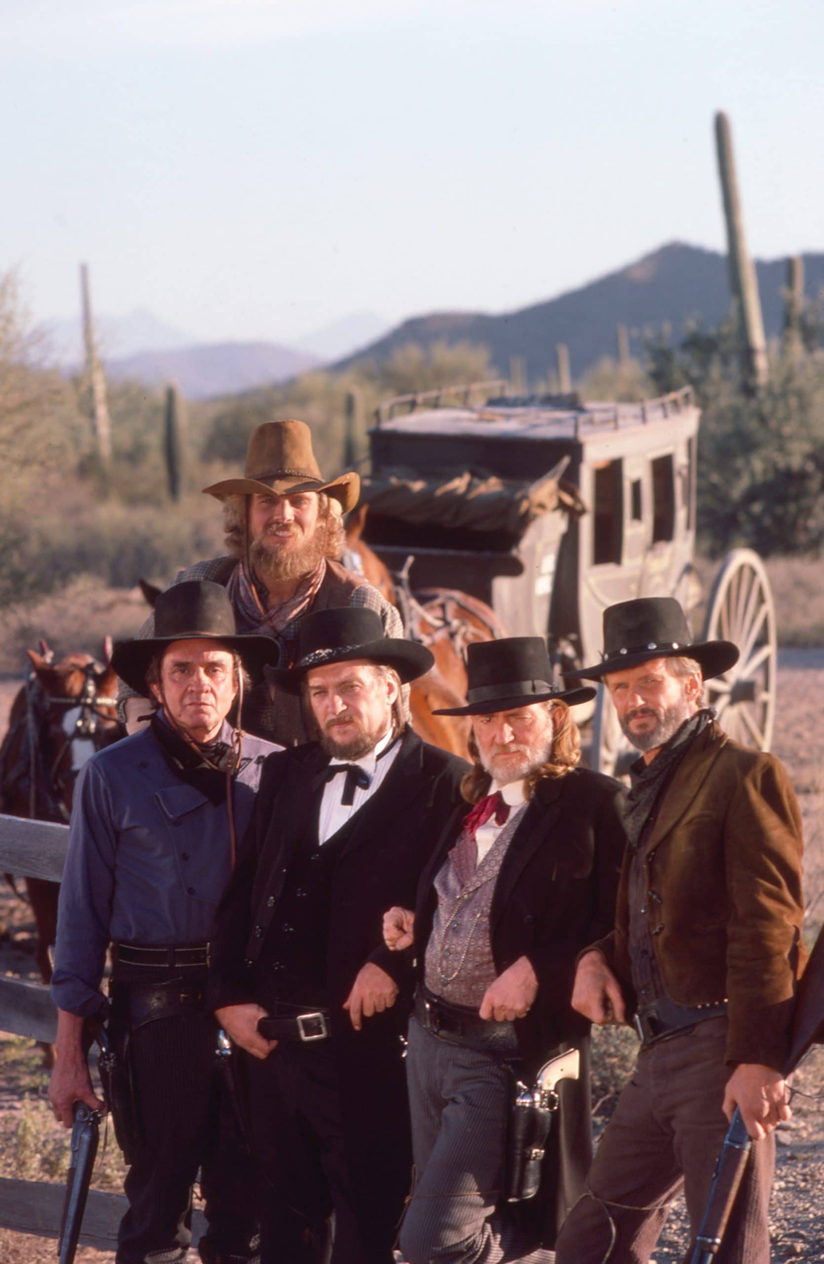 STAGECOACH, front row from left: Johnny Cash, Willie Nelson, Waylon Jennings, Kris Kristofferson, back row: John Schneider