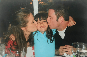 Kelly Preston and John Travolta treated family life as a top priorety, seen here lovingly kissing daughter Ella