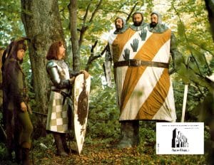 MONTY PYTHON AND THE HOLY GRAIL, from left: Neil Innes, Eric Idle, three heads from left: Terry Jones, Graham Chapman, Michael Palin