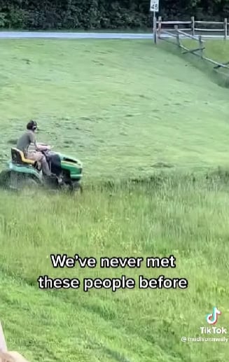 neighbors mowing the lawn