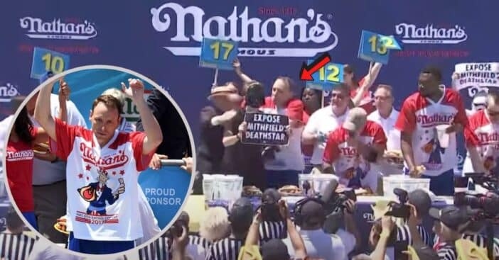 Joey Chestnut Fights Off Protestor In Darth Vader Mask During Hot Dog Eating Contest