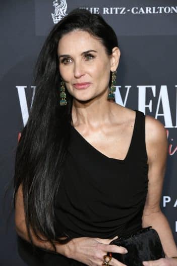 Demi Moore Turns Heads In Plunging White Swimsuit