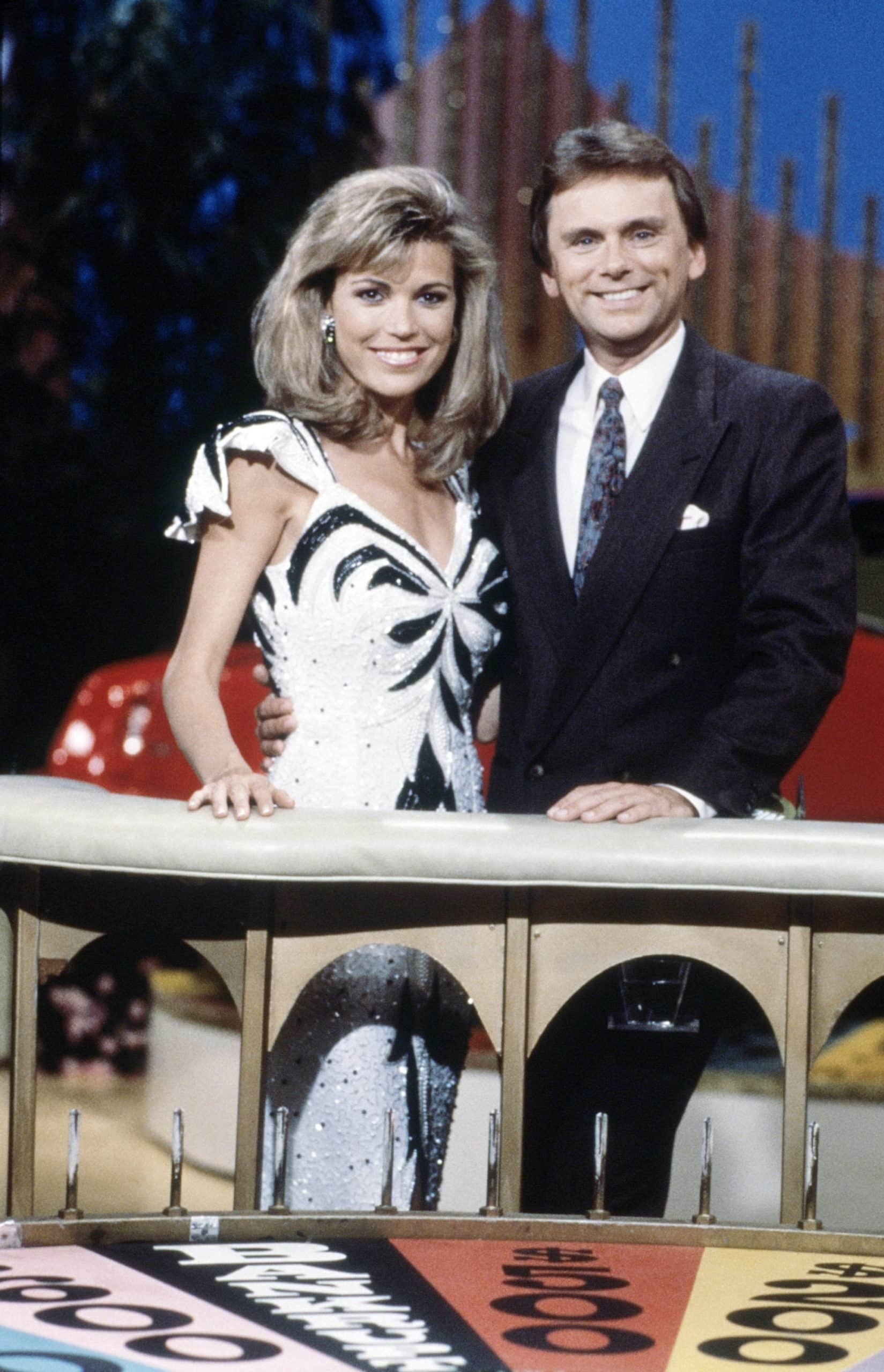 WHEEL OF FORTUNE, from left: Vanna White, Pat Sajak, (1980s), 1975-
