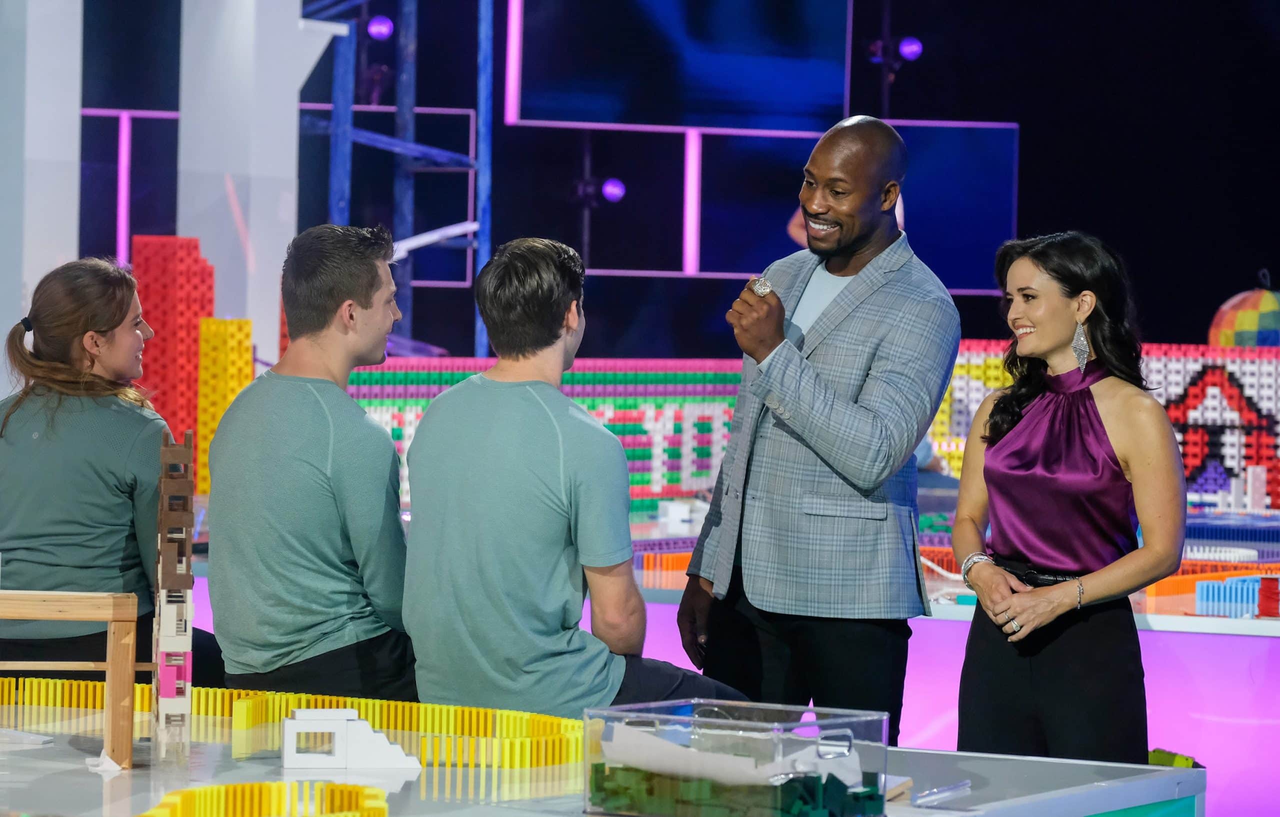 DOMINO MASTERS, contestants from Team Brains &amp; Brawn, (from left: Emma Renner, Chris Wright, Ben Tardif ), Judges Vernon Davis, Danica McKellar 'Finale: The Sky's the Limit' 