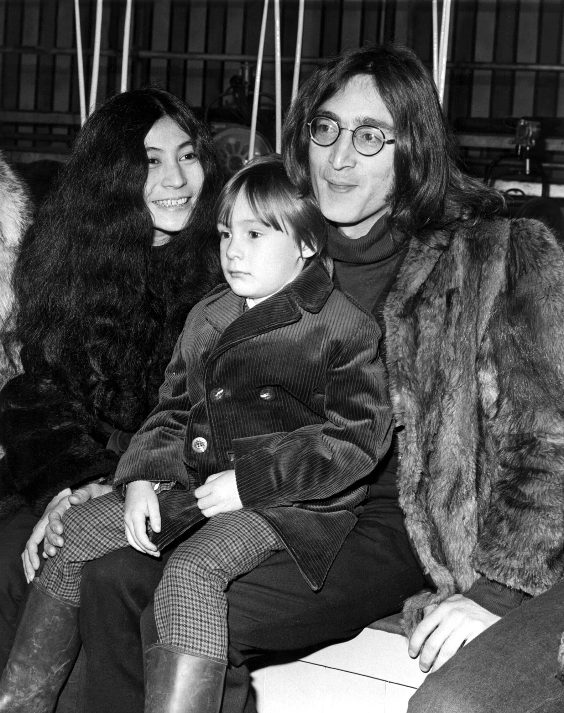 Yoko Ono, Julian Lennon, John Lennon watching the rehearsal for ROLLING STONES' ROCK 'N' ROLL CIRCUS in England, 12/11/68