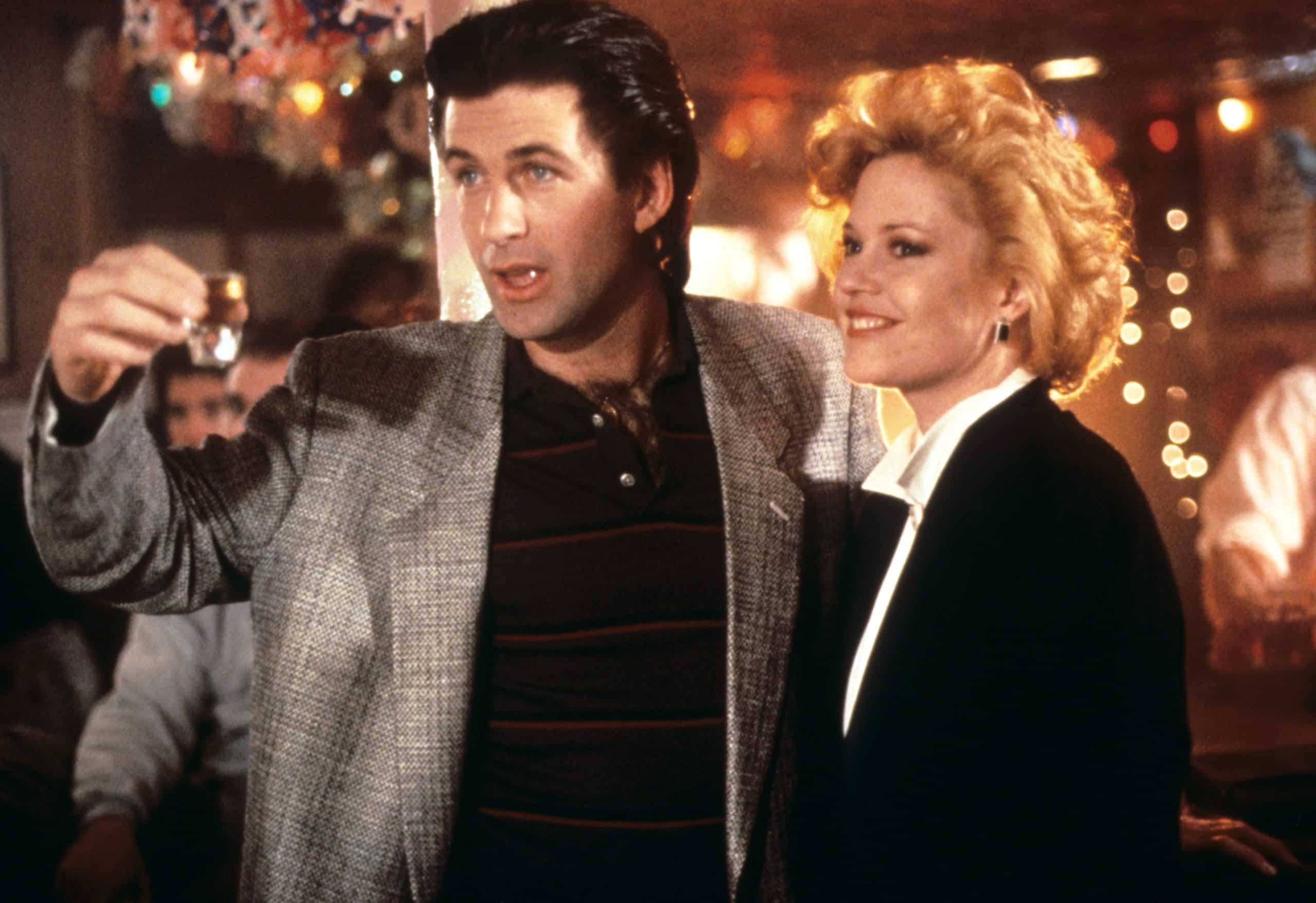WORKING GIRL, from left: Alec Baldwin, Melanie Griffith, 1988