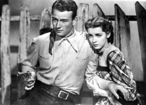 BORN TO THE WEST [aka HELL TOWN], John Wayne, Marsha Hunt