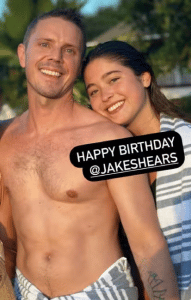 Jake Shears and Lola Consuelos at the beach