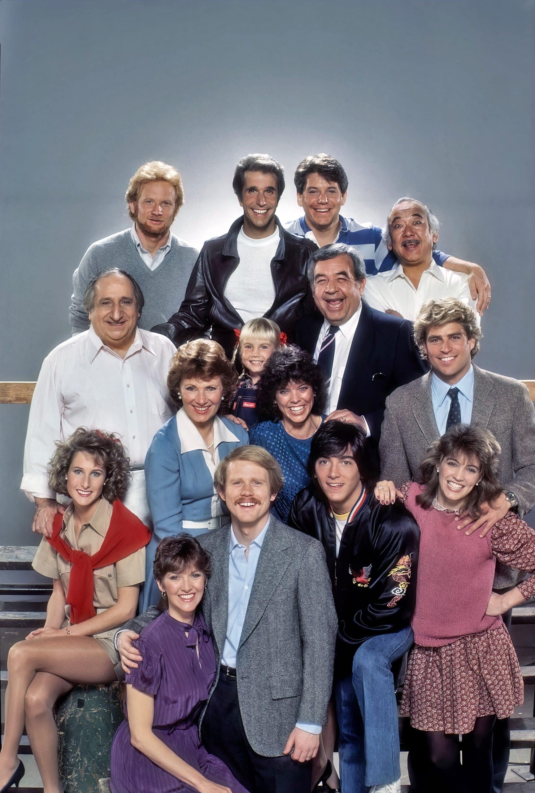 HAPPY DAYS, top from left: Don Most, Henry Winkler, Anson Williams, Pat Morita; middle: Al Molinaro, Marion Ross, Heather O'Rourke, Erin Moran, Tom Bosley, Ted McGinley; bottom: Cathy Silvers, Lynda Goodfriend, Ron Howard, Scott Baio, Crystal Bernard, (1984)