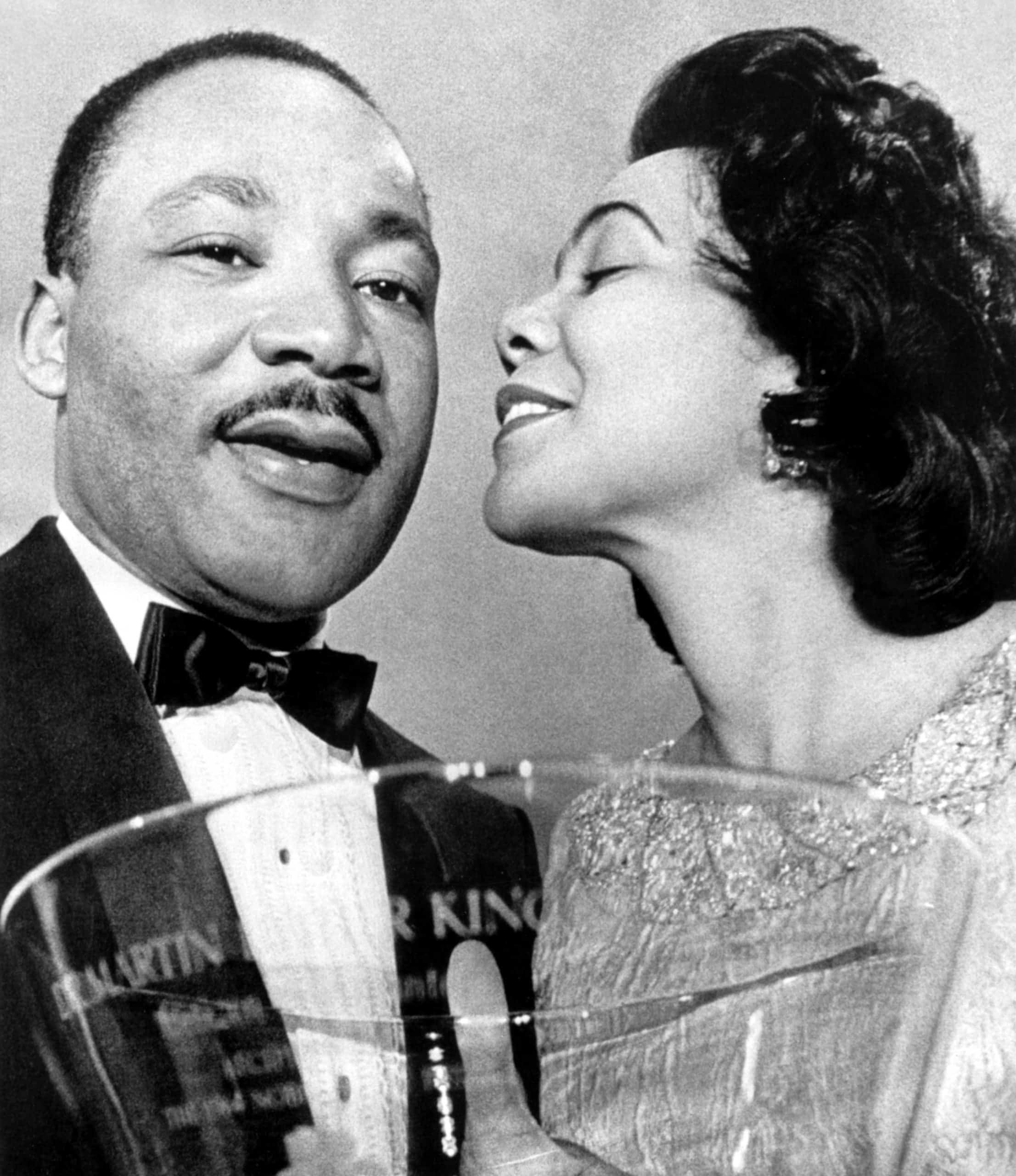 Dr. Martin Luther King Jr., being congratulated by wife Coretta Scott King, after being presented with a Steuben-Glass Bowl Award, Atlanta, GA, January 27, 1965