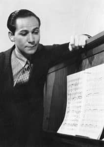 Frank Loesser, the artist behind Baby, It's Cold Outside