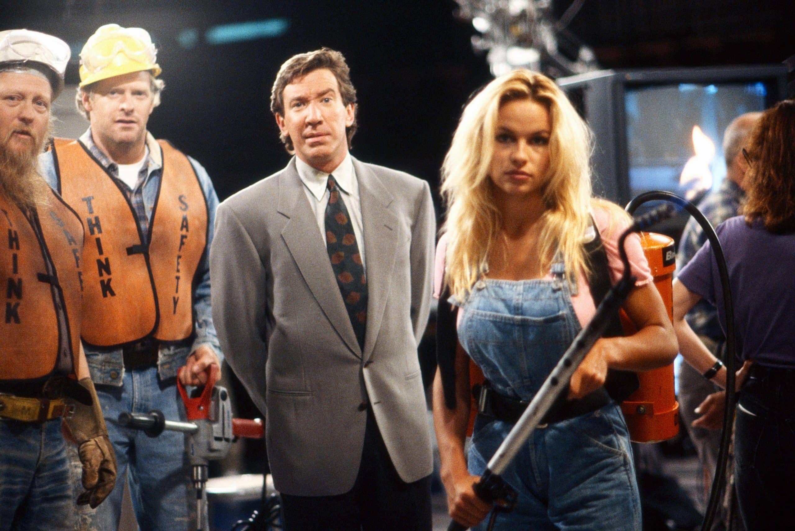 HOME IMPROVEMENT, Mickey Jones (left), Tim Allen (wearing suit), Pamela Anderson, 'Read My Hips', (Season 2 | Episode 1, aired 16 September 1992), 1991-99