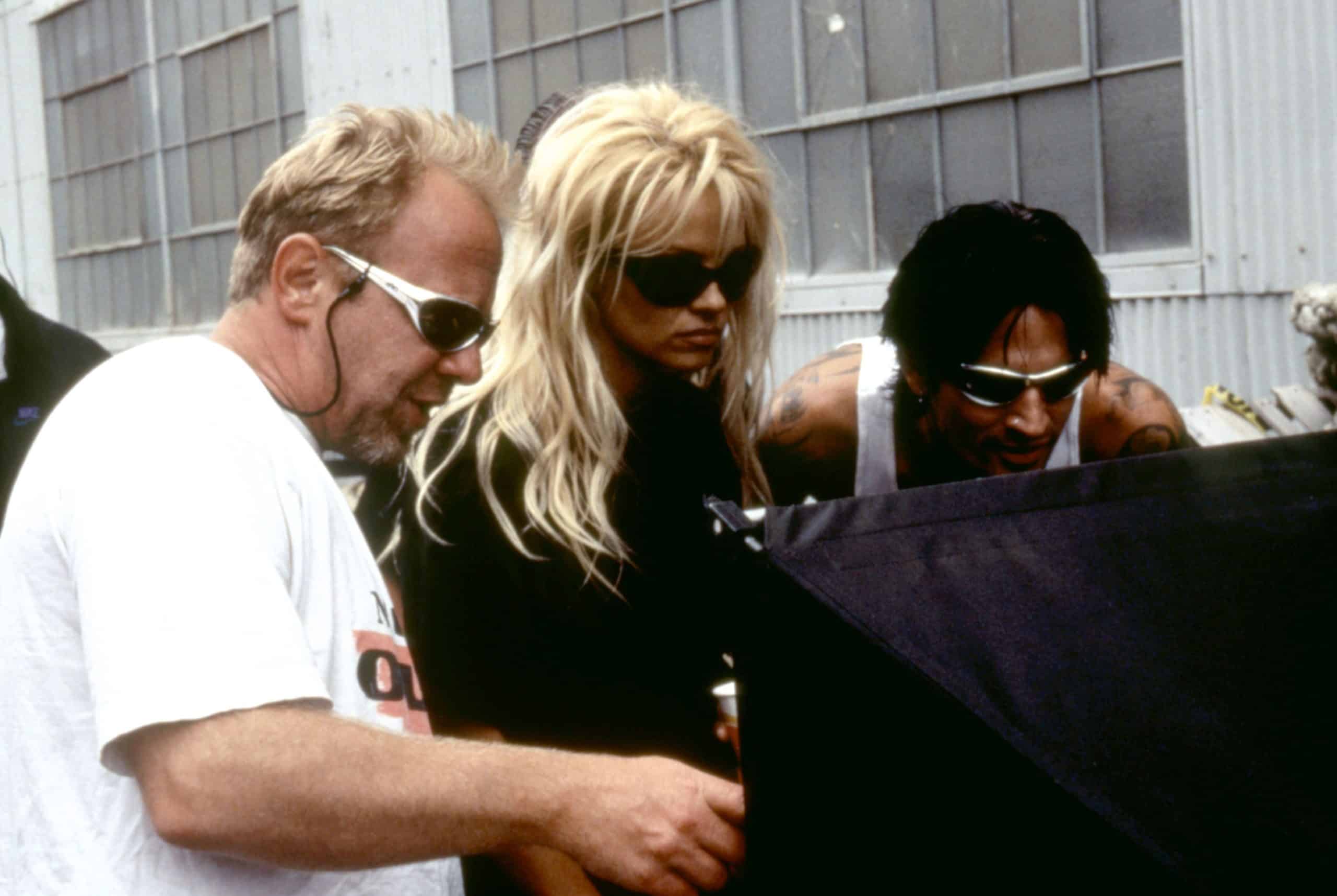 BARB WIRE, director David Hogan, Pamela Anderson, Tommy Lee, on set, 1996