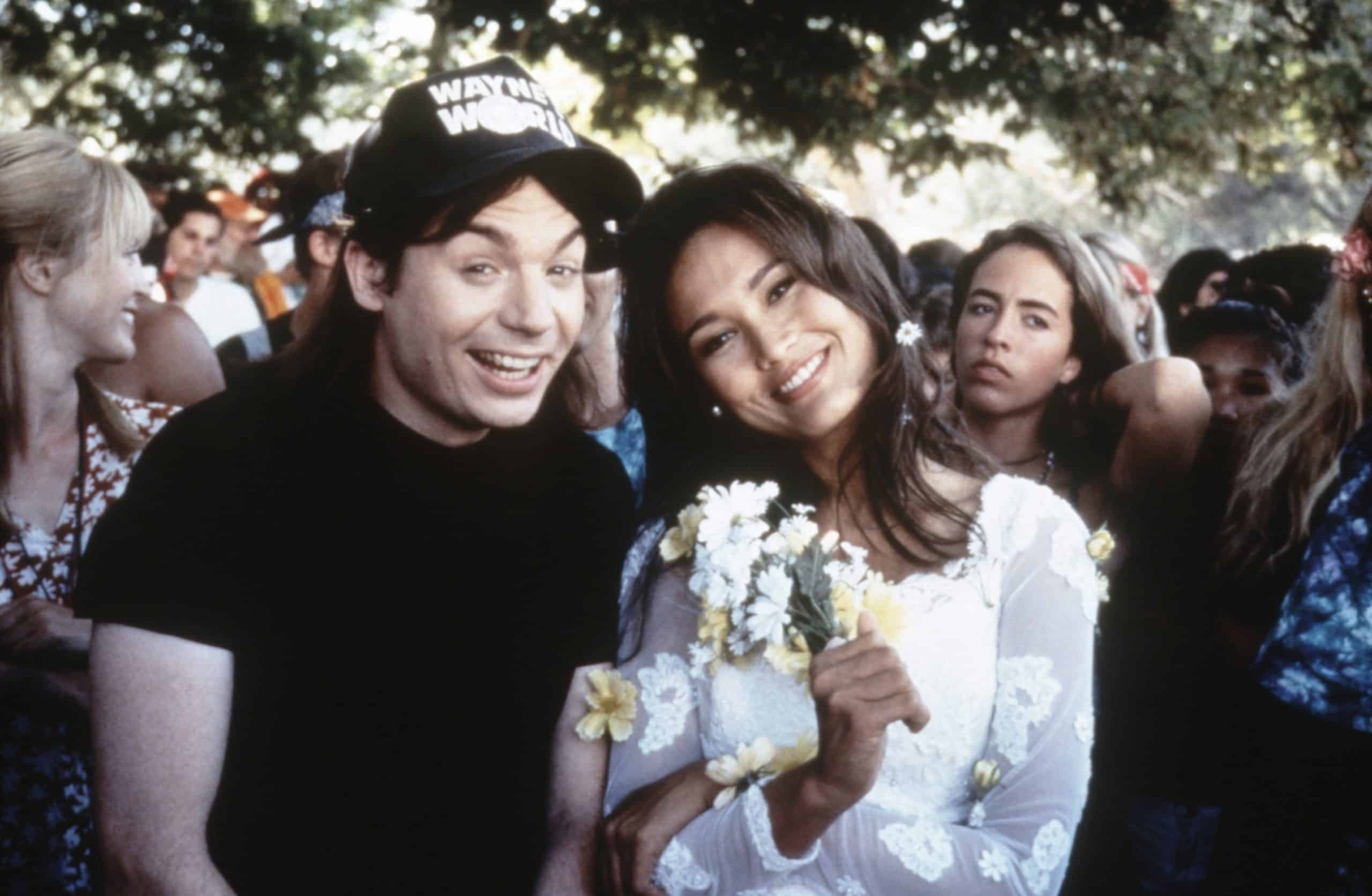 WAYNE'S WORLD 2, from left: Mike Myers, Tia Carrere, 1993
