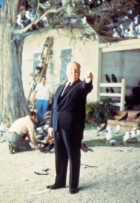 Alfred Hitchcock on the set of The Birds.