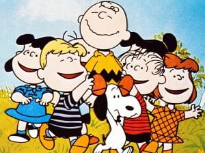 A BOY NAMED CHARLIE BROWN, Charlie Brown, being carried by (from left) Lucy, Schroeder, Snoopy, Violet, Linus, Patty