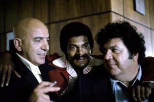 KOJAK, from left, Telly Savalas, Roger Robinson, George Savalas