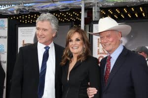 Much of the Dallas cast reunited to give fans a special treat. Pictured: Patrick Duffy, Linda Gray, Larry Hagman at the Cabaret 40th Anniversary Restoration Premiere as part of the 2012