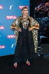 Madonna has had to postpone her upcoming commitments to heal