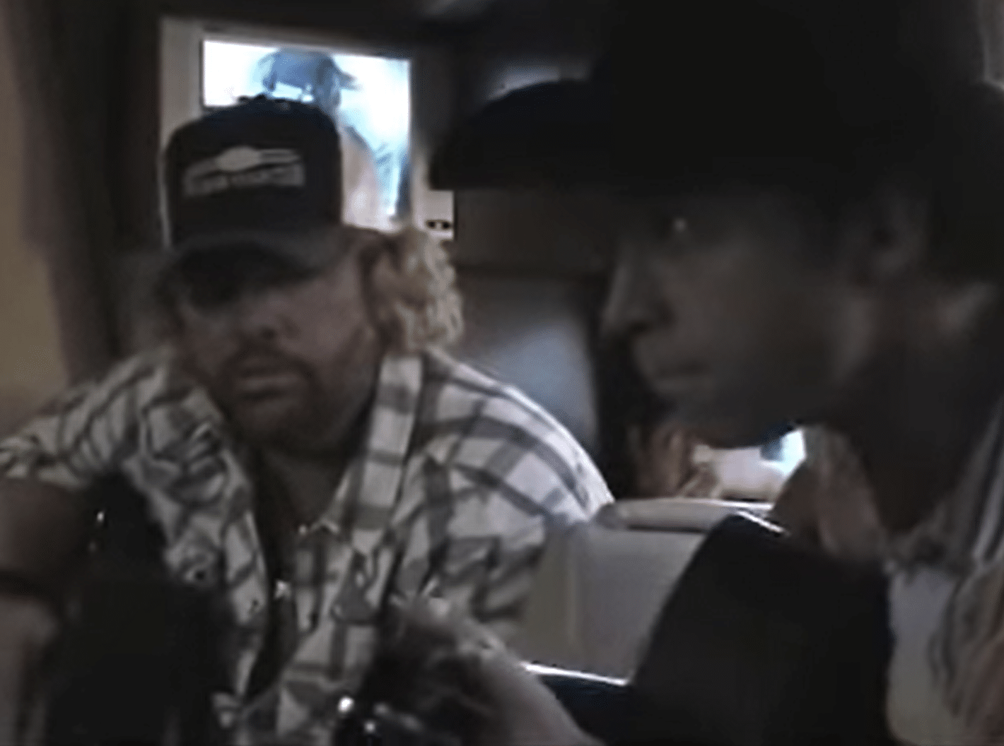 WATCH: Rare Footage Shows Merle Haggard, Toby Keith Singing On Tour Bus