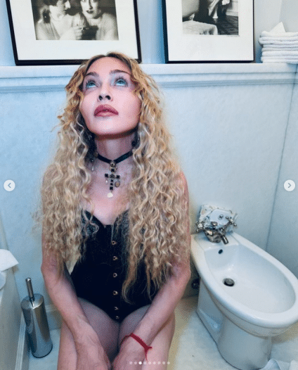 Madonna Wears Tiny Black Leotard And Poses On Toilet For Photoshoot