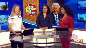 Current CBS executive Jessie Garcia, center, has fond memories competing on The Price Is Right hosted by Bob Barker