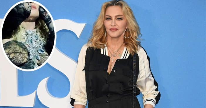 The Material Girl Madonna shows off her figure in an elaborate corset