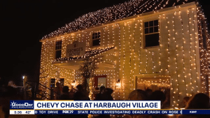 National Lampoon's Christmas Vacation star Chevy Chase lit up the home of Steve Harbaugh