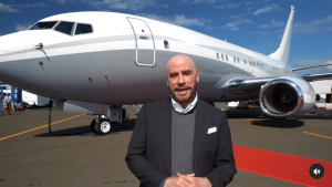 John Travolta has a well-documented love affair with planes, one he is passing on to Peanut