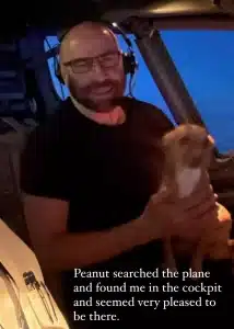 John Travolta was joined by Peanut the dog piloting the plane from the cockpit with dad