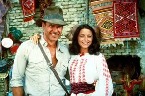 Harrison Ford, Karen Allen on the set of RAIDERS OF THE LOST ARK