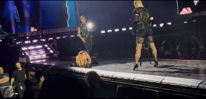 Madonna fell backwards while performing on stage and responded with good humor