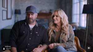 Garth Brooks and Trisha Yearwood serve their wedding cake at his new bar, Friends in Low Places Bar & Honky-Tonk