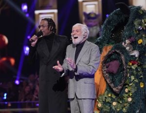THE MASKED SINGER, from left: host Nick Cannon, Dick Van Dyke